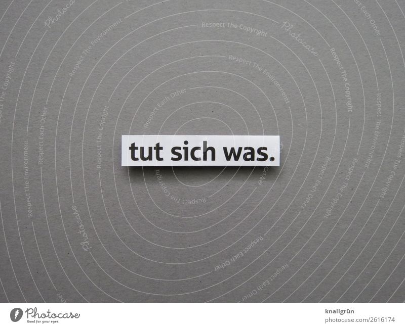 Tut sich was Aktion Tatkraft Bewegung Tun Energie Veränderung Buchstaben Wort Satz Schriftzeichen Typographie Text Kommunikation Sprache machen