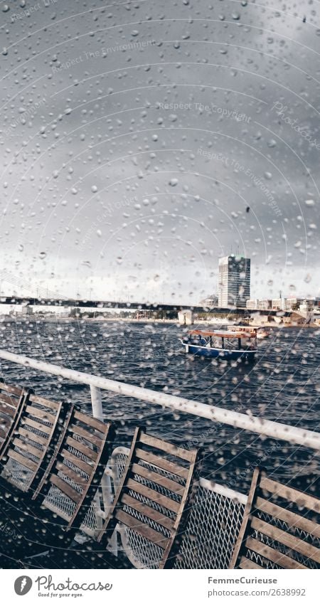 View from the inside of a boat to window with raindrops Verkehr Verkehrsmittel Verkehrswege Personenverkehr Schifffahrt Bootsfahrt Passagierschiff Dampfschiff