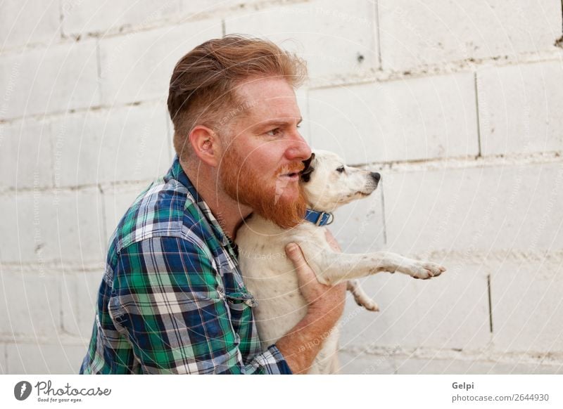 Rothaariger Typ mit seinem Hund Lifestyle Freude Glück Freizeit & Hobby Mensch Junge Mann Erwachsene Freundschaft Tier Park Pelzmantel rothaarig Vollbart