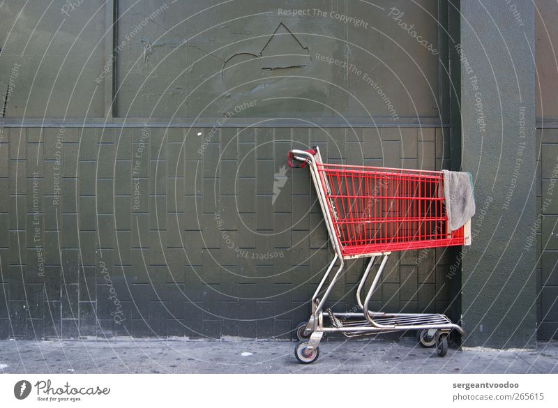 Your future dream is a shopping scheme.... kaufen Handel Supermarkt Stadt Mauer Wand Fassade Einkaufswagen Beton Metall gebrauchen Bewegung fahren eckig trashig