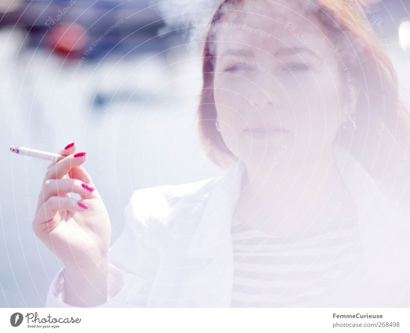 Taking a cigarette break I. Junge Frau Jugendliche Erwachsene Kopf Hand Finger 1 Mensch 18-30 Jahre Erholung Zigarette Zigarettenrauch Rauchen Tabakwaren rot