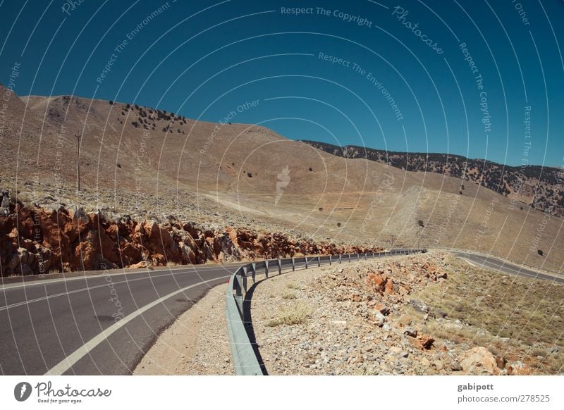 endlosschleife Landschaft Urelemente Erde Wolkenloser Himmel Sommer Felsen Berge u. Gebirge Verkehrswege Autofahren Straße Wege & Pfade trist trocken blau braun