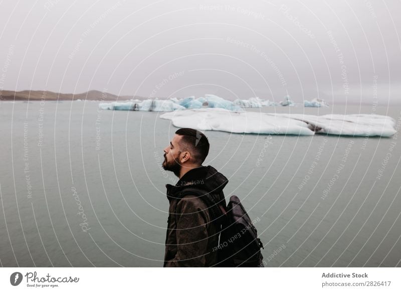 Bartiger Mann am Jökulsárlón Gletscher Meer Natur bärtig Eis Landschaft Ferien & Urlaub & Reisen Tourismus Island Umwelt Eisberg Winter weiß schwer polar Wasser