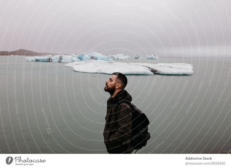 Bartiger Mann am Jökulsárlón Gletscher Meer Natur bärtig Eis Landschaft Ferien & Urlaub & Reisen Tourismus Island Umwelt Eisberg Winter weiß schwer polar Wasser