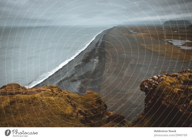 Dyrholaey, Island Reynisfjara Landschaft Insel Berge u. Gebirge Ferien & Urlaub & Reisen Küste Atlantik Felsen schwarz Meereslandschaft vulkanisch Strand Klippe