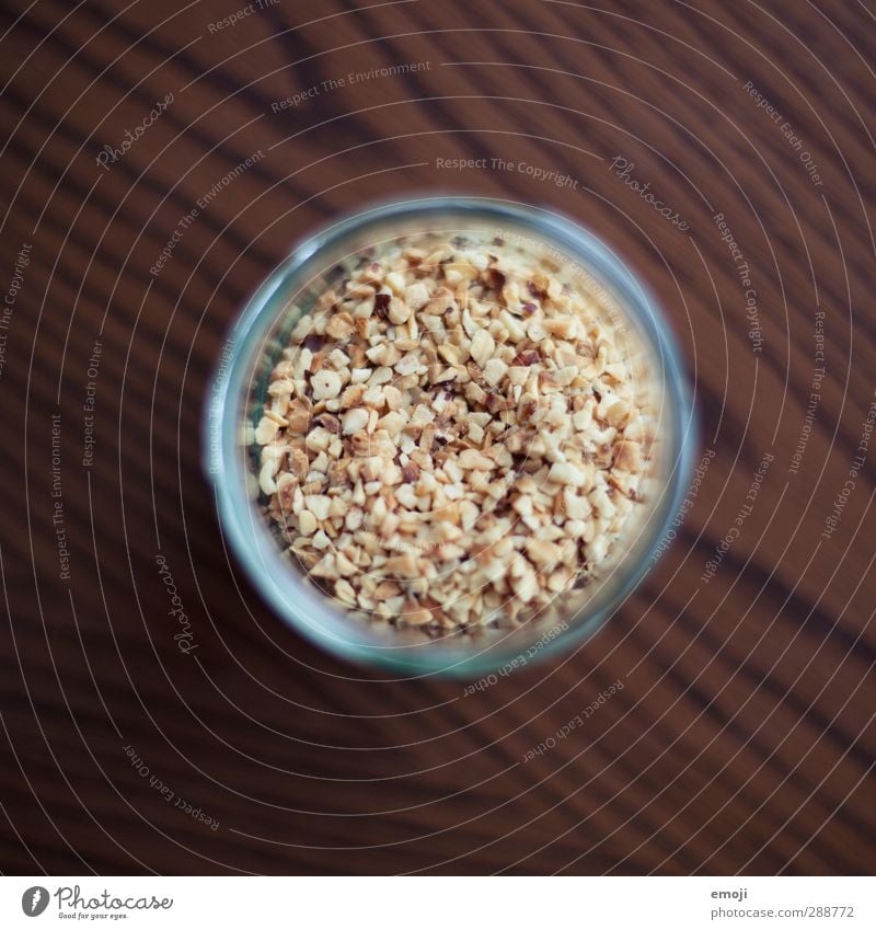 drive me NUTS Lebensmittel Nuss Haselnuss Streusel Ernährung Glas lecker braun Farbfoto Innenaufnahme Nahaufnahme Detailaufnahme Makroaufnahme Menschenleer