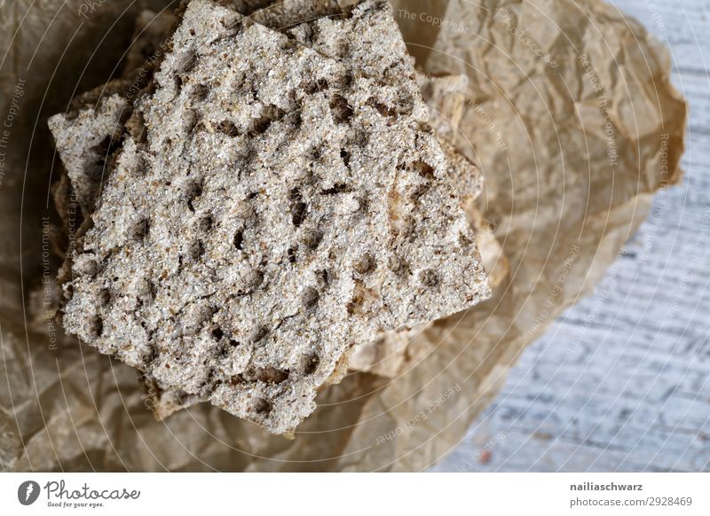 Knäckebrot Lebensmittel Teigwaren Backwaren Brot Ernährung Bioprodukte Vegetarische Ernährung Papier Backpapier Holz Gesundheit lecker trocken braun grau