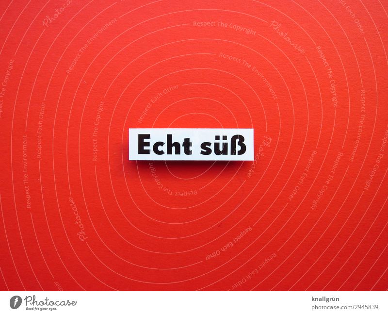 Echt süß Schriftzeichen Schilder & Markierungen Kommunizieren rot schwarz weiß Gefühle Glück Zufriedenheit Interesse Kitsch niedlich Farbfoto Studioaufnahme