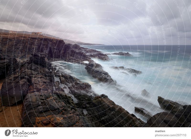 raw Landschaft Erde Sand Himmel Wolken Horizont schlechtes Wetter Sturm Felsen Berge u. Gebirge Schlucht Küste Strand Fjord Riff Meer blau braun grau zerklüftet