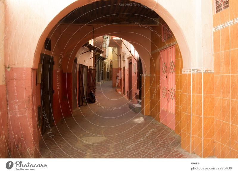 Archway in an alley in the old city of Tangier in Morocco Haus Mauer Wand Tür Coolness orange rot Romantik calm colorful copy space countryside exotic narrow