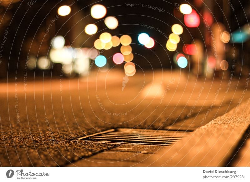 Nightlights Stadt Stadtzentrum Verkehr Straßenverkehr Autofahren Busfahren Wege & Pfade Ampel blau braun gelb orange schwarz weiß kreisen Langzeitbelichtung