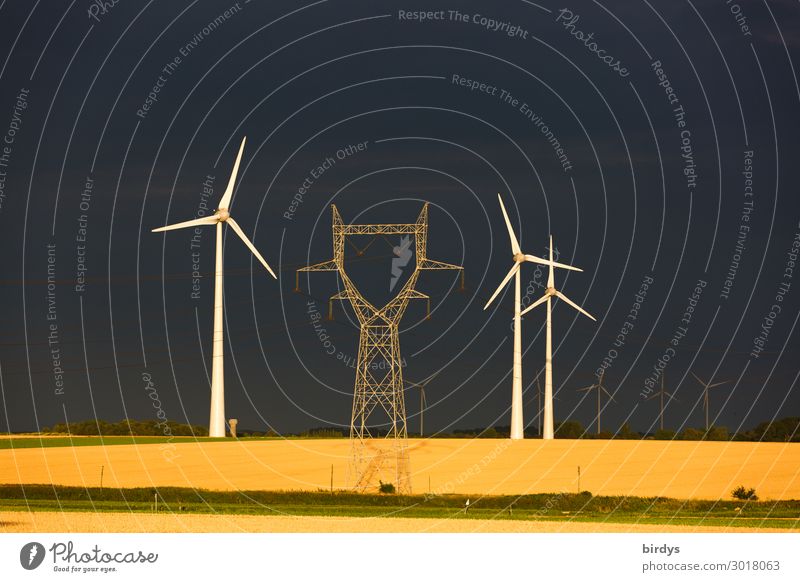 Windenergie Energiewirtschaft Erneuerbare Energie Windkraftanlage Gewitterwolken Sonnenlicht Sommer Getreide Getreidefeld Feld drehen authentisch