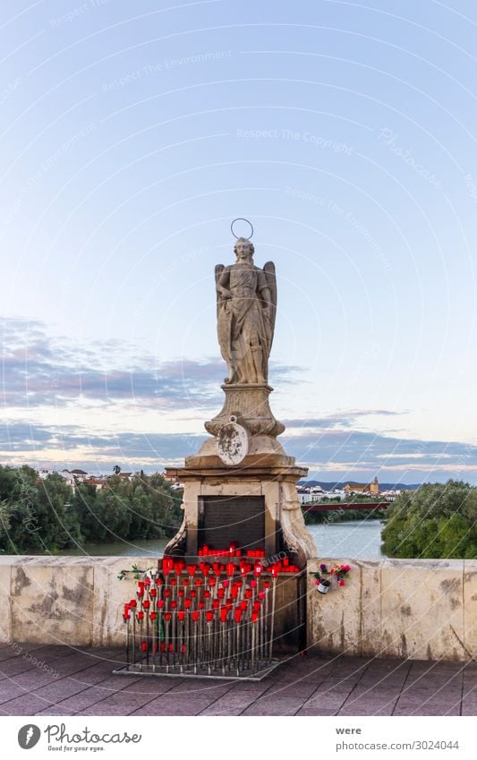 Holy figureon the Roman bridge in cordoba Brücke Bauwerk Religion & Glaube Andalusia Cordoba Guadalquivir Holiday Saint worship Spain bridge saint candles