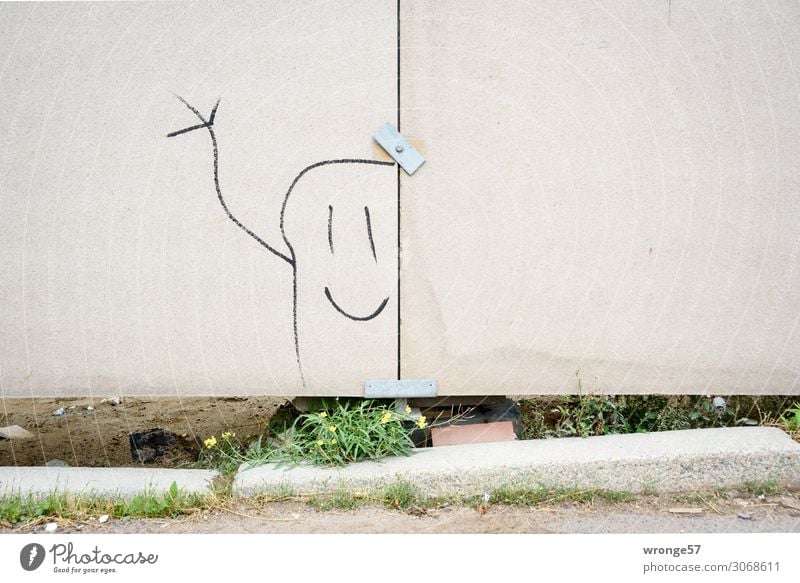 Hallo Freude Mensch 1 Zaun Graffiti Freundlichkeit verrückt Stadt grau grün schwarz Strichmännchen winken Bauzaun Holzfaserplatte Baustelle lustig Farbfoto