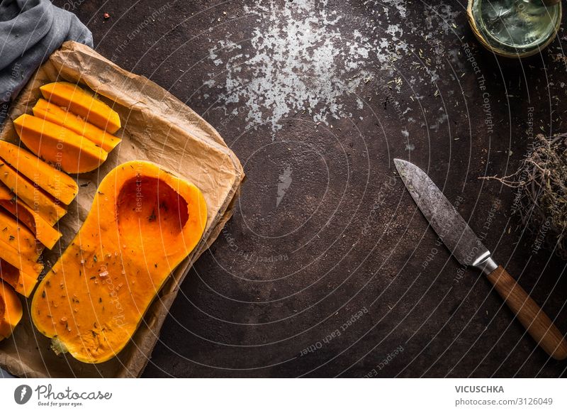 Hintergrund mit Butternusskürbis Lebensmittel Gemüse Ernährung Bioprodukte Vegetarische Ernährung Diät Messer Stil Design Gesunde Ernährung Tisch Erntedankfest