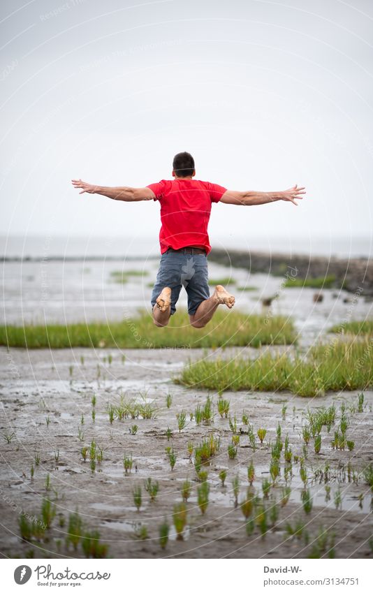 Sprung im Watt Mensch maskulin Junger Mann Jugendliche Erwachsene Leben 1 Kunst Umwelt Natur Landschaft Sommer Schönes Wetter schlechtes Wetter Nordsee Ostsee