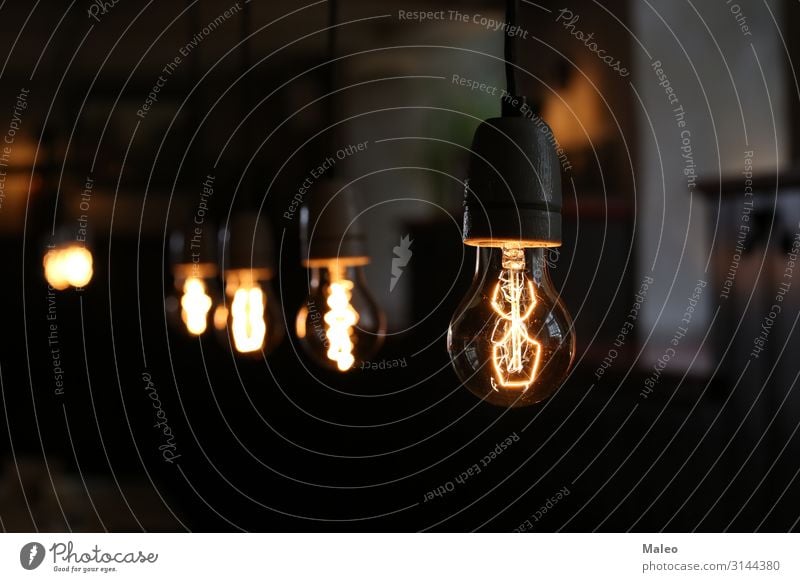 Klassische elektrische Glühlampe klassisch Glühbirne Hintergrundbild schwarz hell Lampe Konzepte & Themen Konzert Kreativität Design Elektrizität Energie