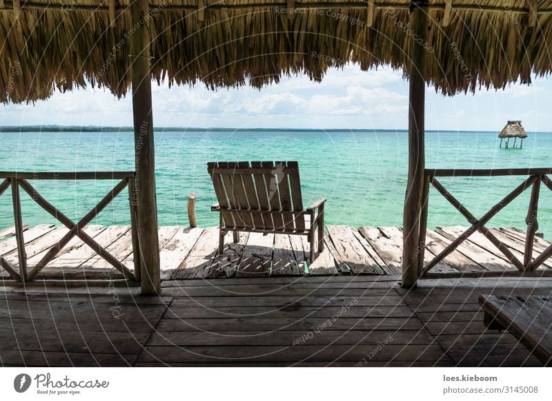 Dock with chair at lake Itza Wellness harmonisch Erholung ruhig Meditation Ferien & Urlaub & Reisen Tourismus Abenteuer Ferne Freiheit Sommer Sonne Strand Natur