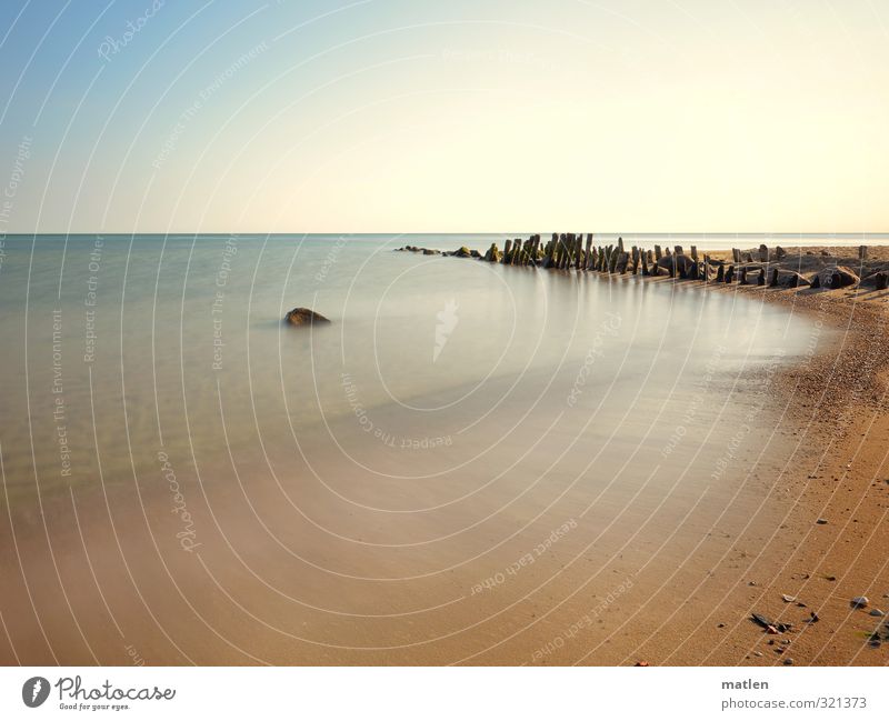 Flaute Natur Landschaft Sand Wasser Himmel nur Himmel Horizont Sonne Sonnenlicht Wetter Schönes Wetter Küste Strand Ostsee Menschenleer blau braun Buhne Stein