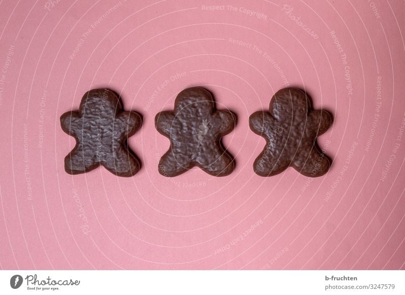 Lebkuchenmänner Lebensmittel Süßwaren Schokolade Feste & Feiern Weihnachten & Advent Zeichen Essen Fröhlichkeit frisch rosa lebkuchenfigur Lebkuchenmann 3 Reihe