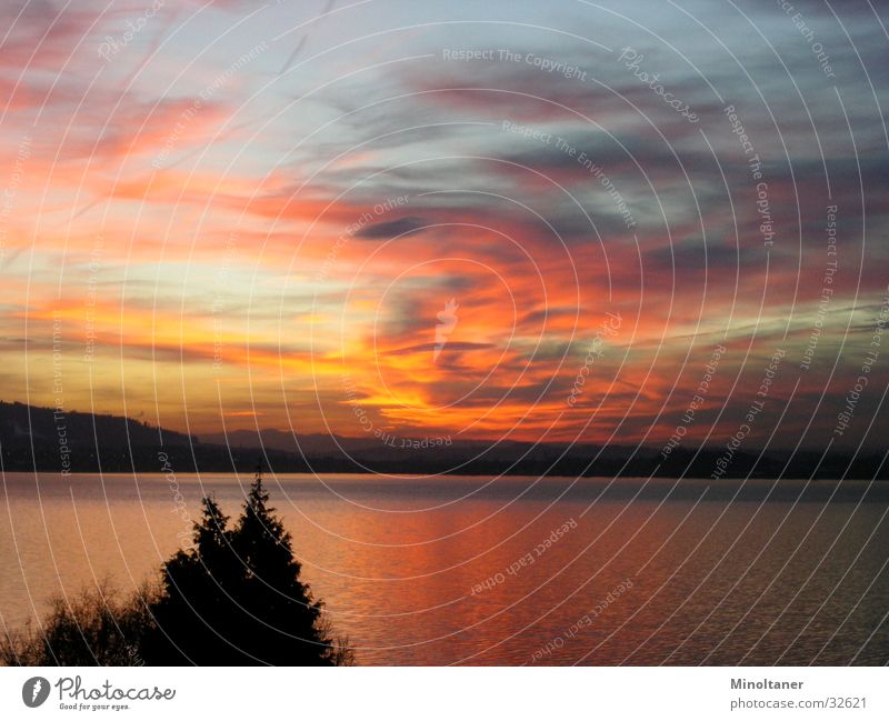 colored sunset Sonnenuntergang Wolken See Himmel Wasser Berge u. Gebirge Landschaft