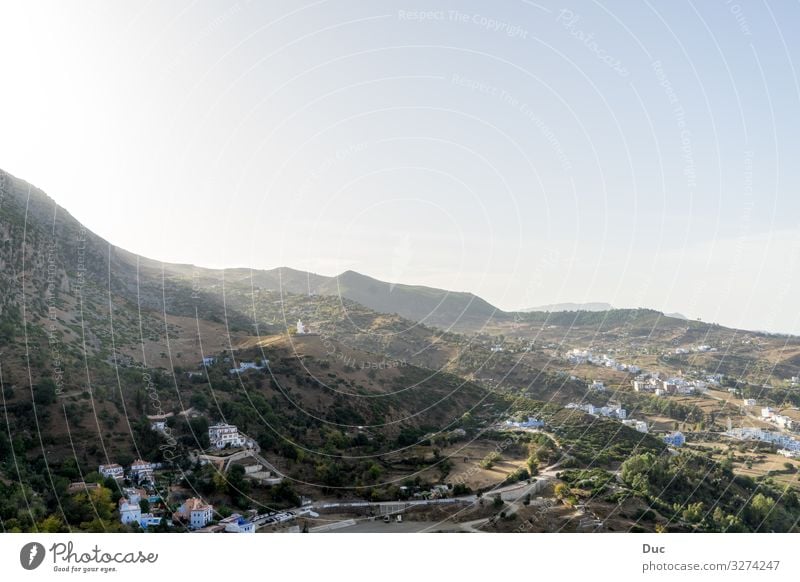 View over Chefchaouen Sommer Strand Natur Riff Stimmung landscape mountain water sky hill Großstadt valley fog architecture tree Island sea house horizontal