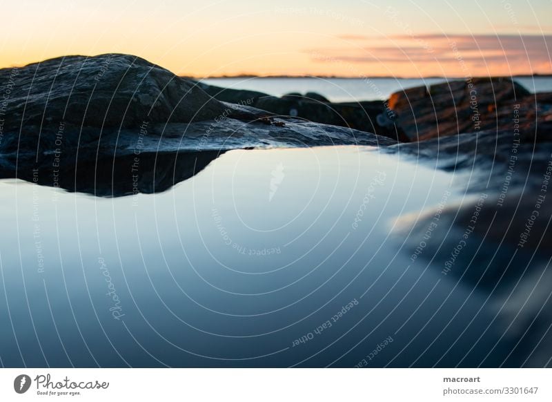 Wasserfläche am Abend Abenddämmerung Himmel Himmel (Jenseits) Landschaft See Meer Sonnenaufgang Natur cloud Strand blau Berge u. Gebirge dawn Gelassenheit schön