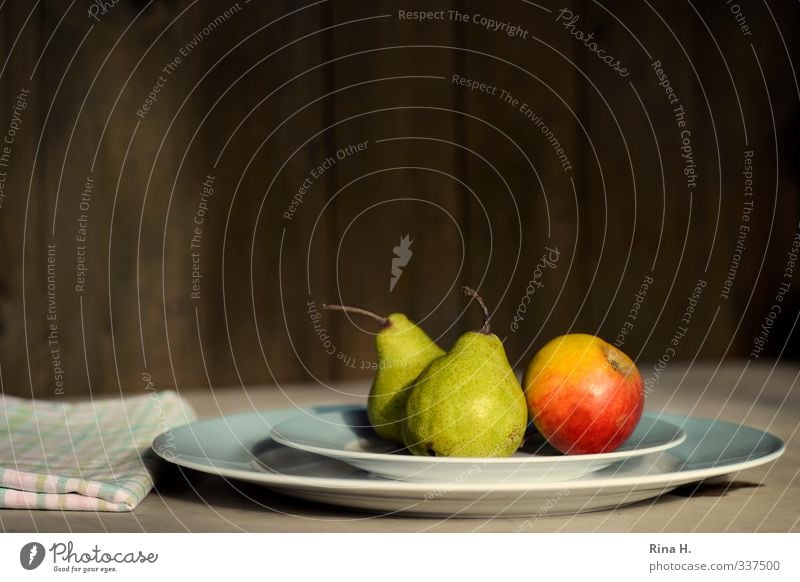 Apfel und Birnen Lebensmittel Frucht Geschirr Teller Gesunde Ernährung Gesundheit lecker natürlich grün rot Vitamin Serviette Stillleben Farbfoto Außenaufnahme