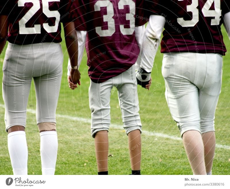 American Football Ballsport Sport Super Bowl Trikot Team gemeinsam zusammenhalt 33 25 34 waten bekleidung dick dünn rasen Sportplatz Spielfeld gewinnen