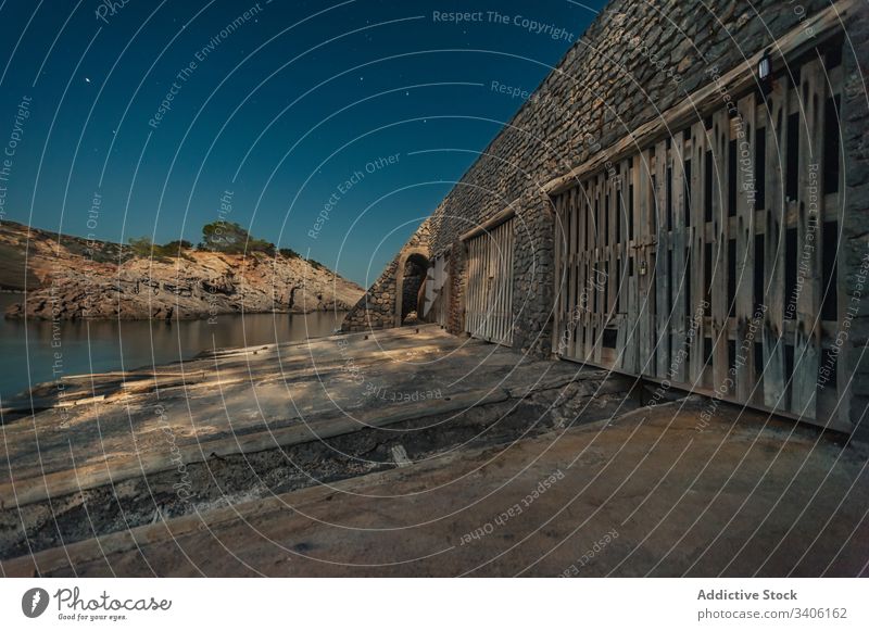 Altes Steingebäude an der Küste bei Nacht Gebäude alt Ufer MEER Himmel Stern Ibiza Cala Es Canaret Spanien Architektur Wasser Ausflugsziel Konstruktion