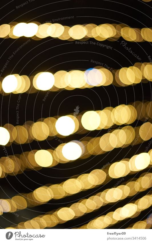 Unscharfe Bokeh-Textur von der Weihnachtsbeleuchtung abstrakt verschwommen glitzernd hell gold Hintergrund Weihnachten Unschärfe Licht glänzend Feiertag Glanz