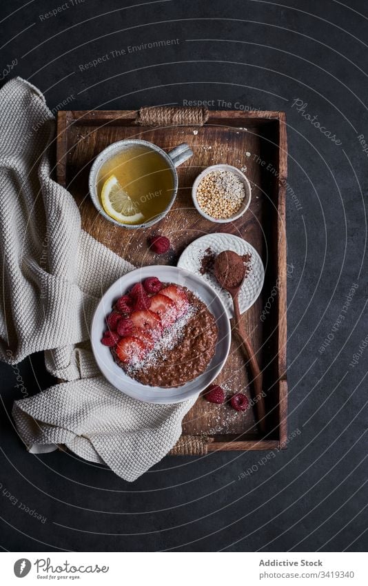 Gesundes Frühstück mit Smoothie-Schale und Tee gesunde Ernährung Schalen & Schüsseln frisch organisch Beeren natürlich geschmackvoll lecker Küche Mahlzeit Müsli