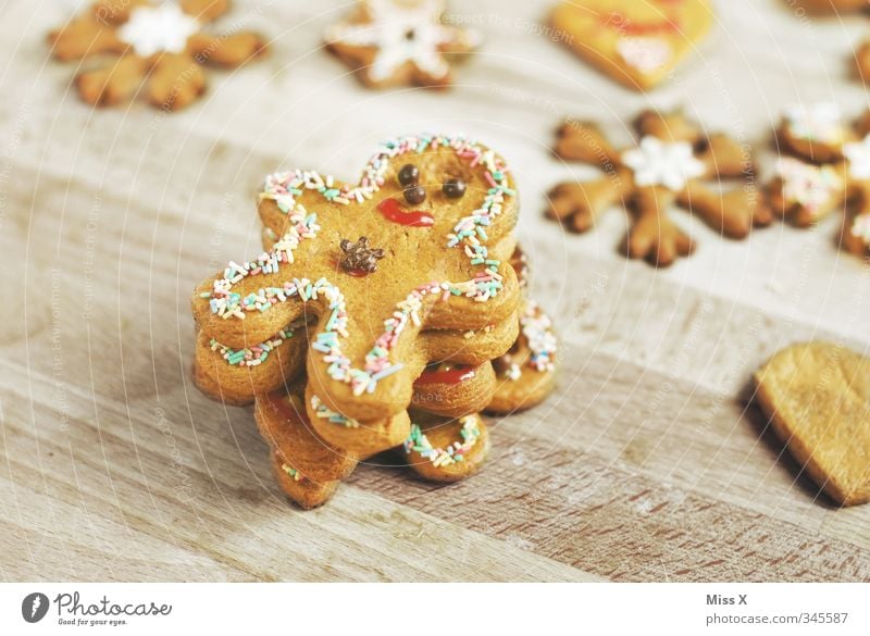 Lebkuchenmännchen Lebensmittel Teigwaren Backwaren Süßwaren Schokolade Ernährung lecker süß Plätzchen Weihnachtsgebäck Männchen Weihnachtsdekoration Farbfoto