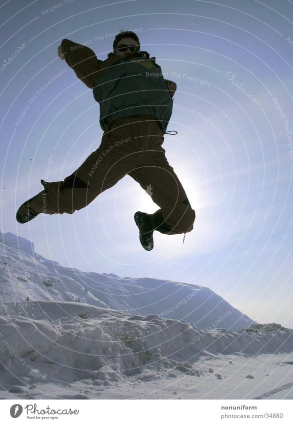 jep - ab auf die Piste springen Gegenlicht Winter Ferien & Urlaub & Reisen Mann spung Schnee Freude Berge u. Gebirge um 10 in stanton fun snow moutain