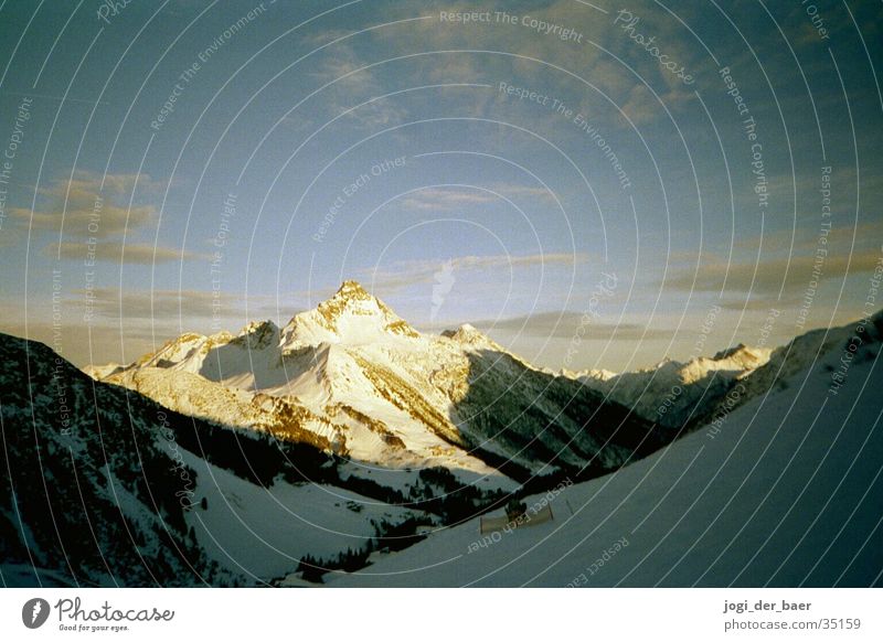 Alpenpanorama 3 Wolken Sonnenstrahlen Berge u. Gebirge Himmel Schnee Schatten Tal