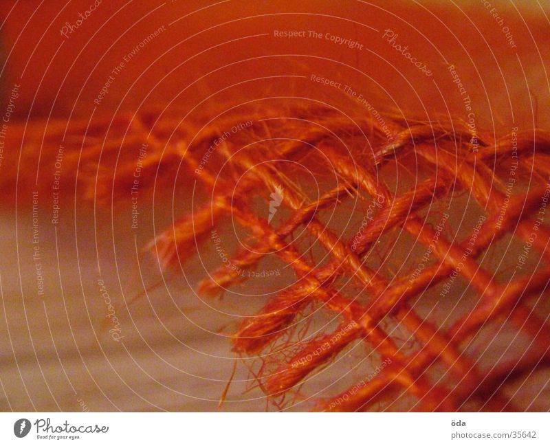 rotes Netz Stoff Dekoration & Verzierung Schlaufe Makroaufnahme Nahaufnahme