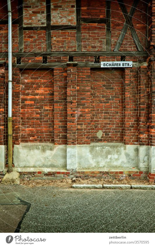 Fachwerkhaus in der Schäferstraße fachwerk fachwerkhaus mauer mauerwerk ziegel mauerziegel wohnhaus alt antik historisch menschenleer textfreiraum fuge klinker