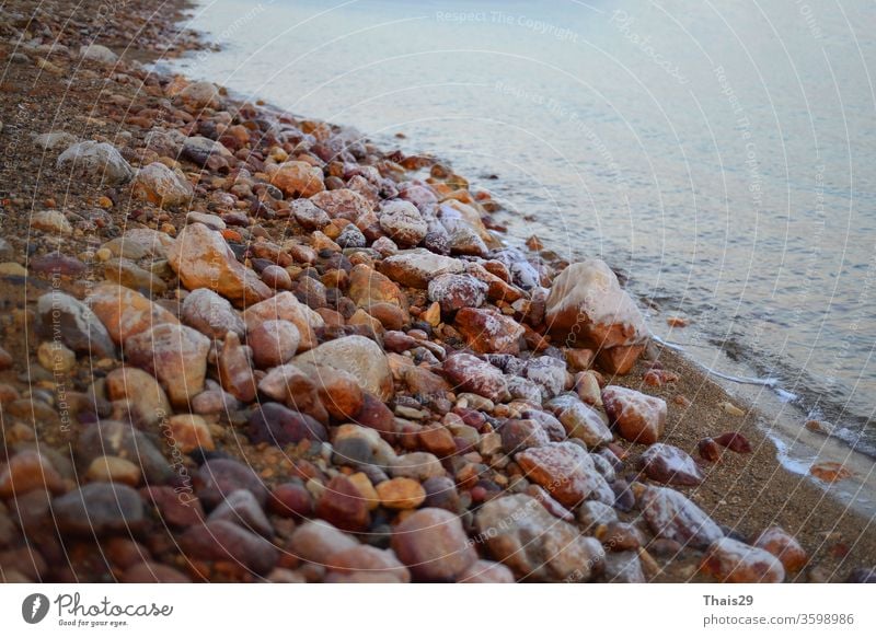 Sonnenuntergang am Strand des Toten Meeres Kieselsteine an der Küstenlinie Stein Natur MEER Landschaft Abend schön Schönheit natürlich sonnig niemand Wasser