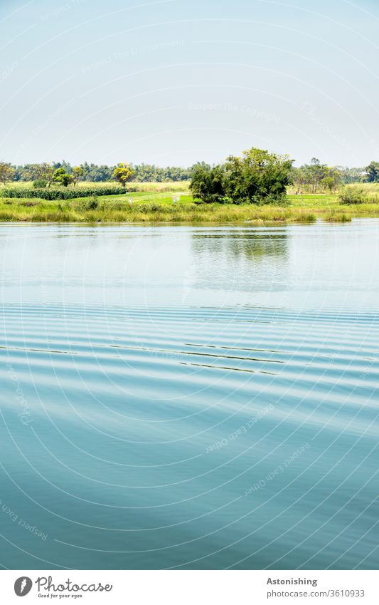 Wellen am Thu Bon Fluss in der Nähe von Hoi An, Vietnam Blau grün Insel Natur Landschaft Himmel Baum Busch Sträucher Wetter Sommer Wärme Reflexion & Spiegelung