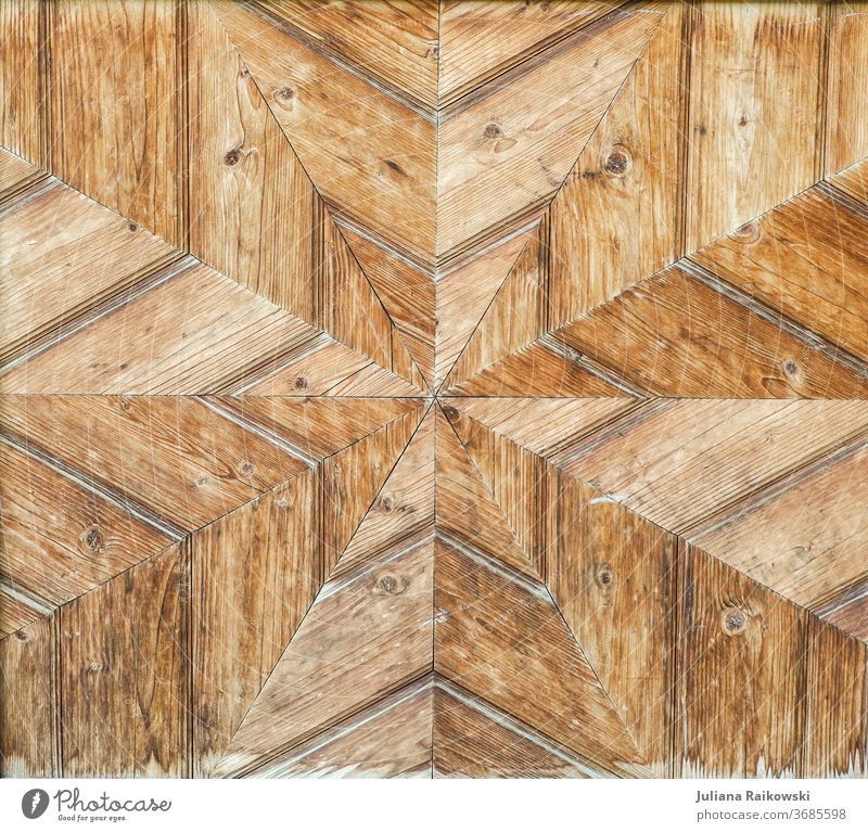 Holzwand mit Sternmuster Hintergrund braun alt Textfreiraum retro Textur hölzern rustikal natürlich Natur Oberfläche Holzplatte texturiert Menschenleer Farbfoto