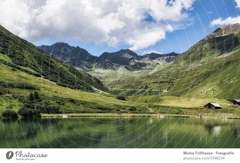 Serfaus-Fiss-Ladis, Österreich Alpen Berge Täler See Landschaft Natur Hüttenferien Berghütten Holzhütten Gras Bäume Weide Wiese Felsen Tourismus reisen wandern