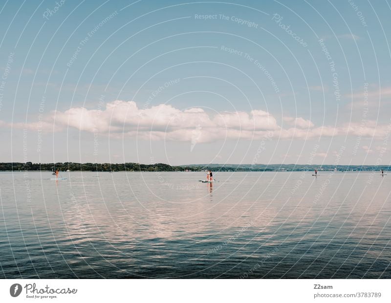 Stand-Up-Paddling am Starnberger See wassersport see spiegelung Reflexion & Spiegelung bewegung erholung ruhe entspannung baden wolken blau bayern urlaub ferien