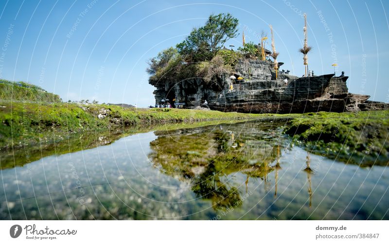 tanah lot Natur Wolkenloser Himmel Meer Indischer Ozean Glück Vertrauen Tempel Küste Buddhismus Buddha heilig Bali Indonesien Hinduismus Moos Freiheit