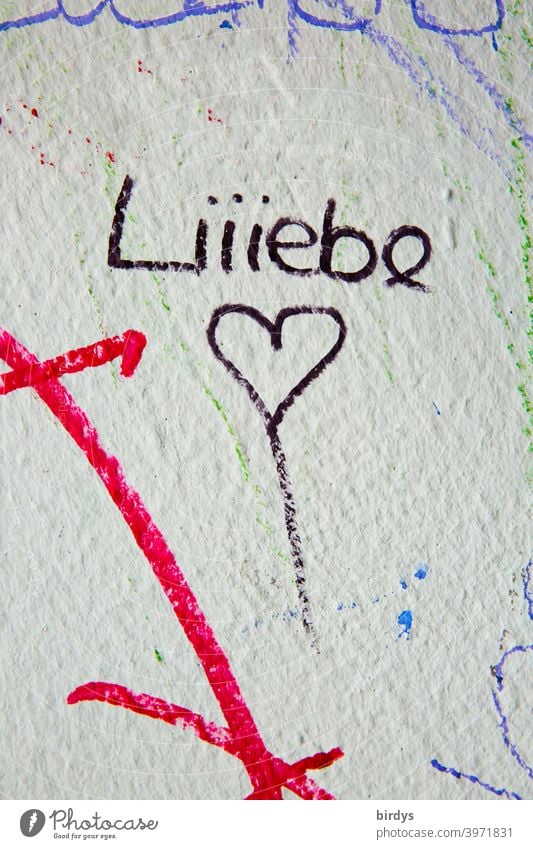 Schriftzug Liebe in langezogen betonter Schreibweise, Liebe mit Herz Liebeserklärung verliebt betonung Liebesbekundung Verliebtheit jugendlich Gefühle