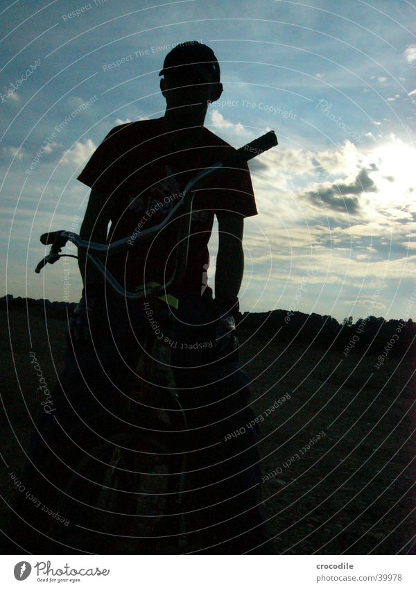 Biker Wolken Gegenlicht Hochformat fahren Stil Fahrrad Mensch Sonne peschl BMX fun Freude biken