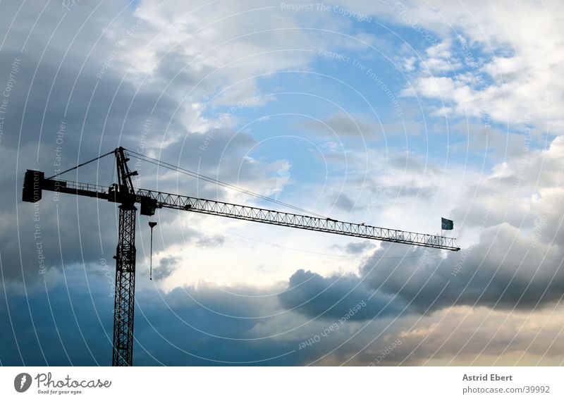 Baukran Kran Wolken Sonnenuntergang Industrie bauen Himmel Wetter Gewitter