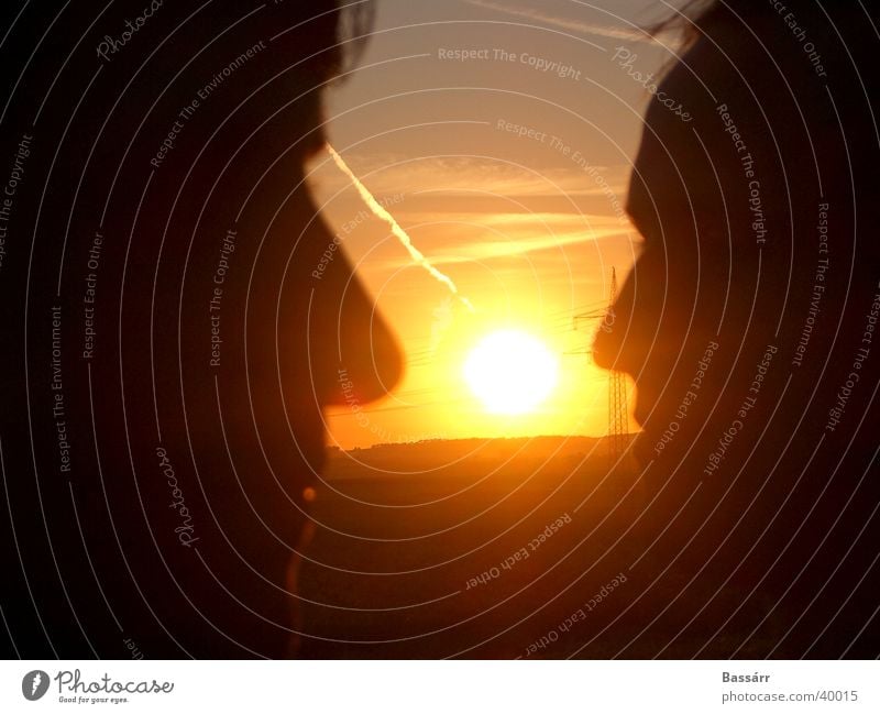 Goldnasen Sonnenuntergang Silhouette Gegenüberstellung Freundschaft Mann Schatten Inszinierung