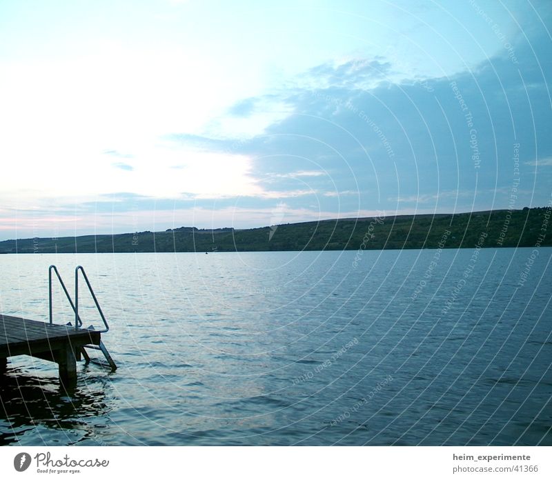 Süßer See Steg Sonnenuntergang Ferien & Urlaub & Reisen Abend Wolken Stil Naturphänomene Romantik Meer Strand Halbinsel aseleben Wasser Landschaft