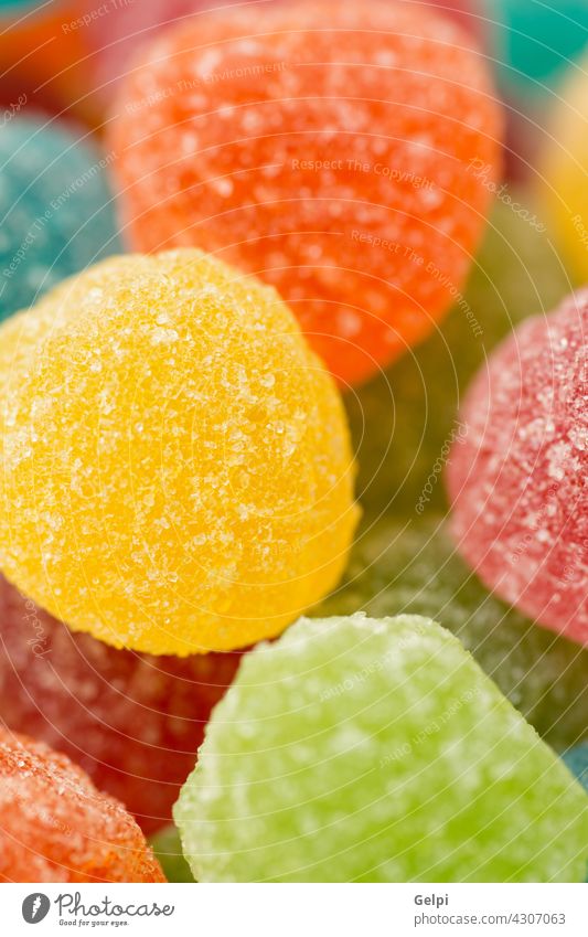 Bunte Gummibärchen als Tapete verwenden süß Zucker Bonbon orange Götterspeise Lebensmittel abschließen grün Konfekt Hintergrund farbenfroh gelb festlich