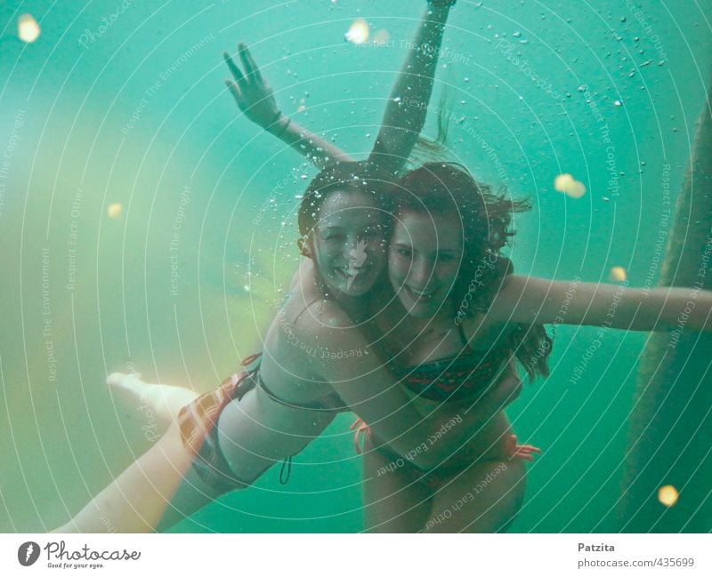 Unterwasserwelt tauchen Unterwasseraufnahme Mädchen Sonnenstrahlen Wasser tief Meer See Freude lachen Schwimmen & Baden Im Wasser treiben Schwimmsport Nixe